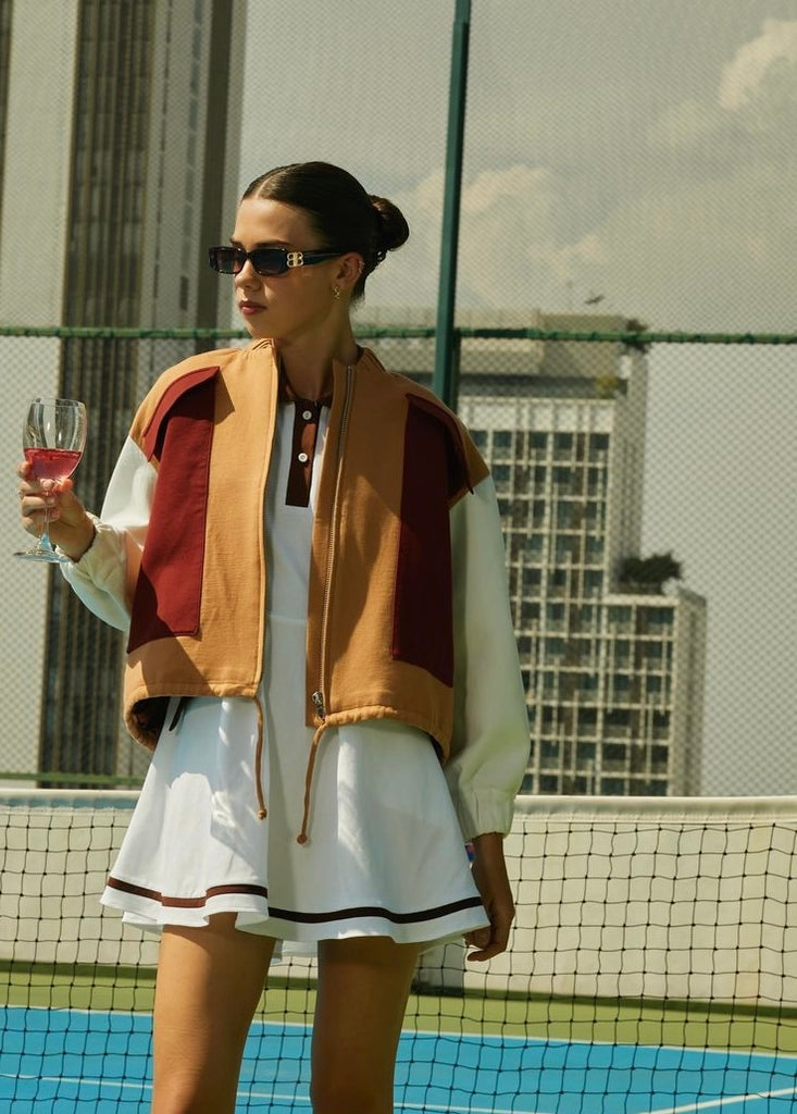 Women wearing golf dress and jacket in the golf course Bangkok Thailand